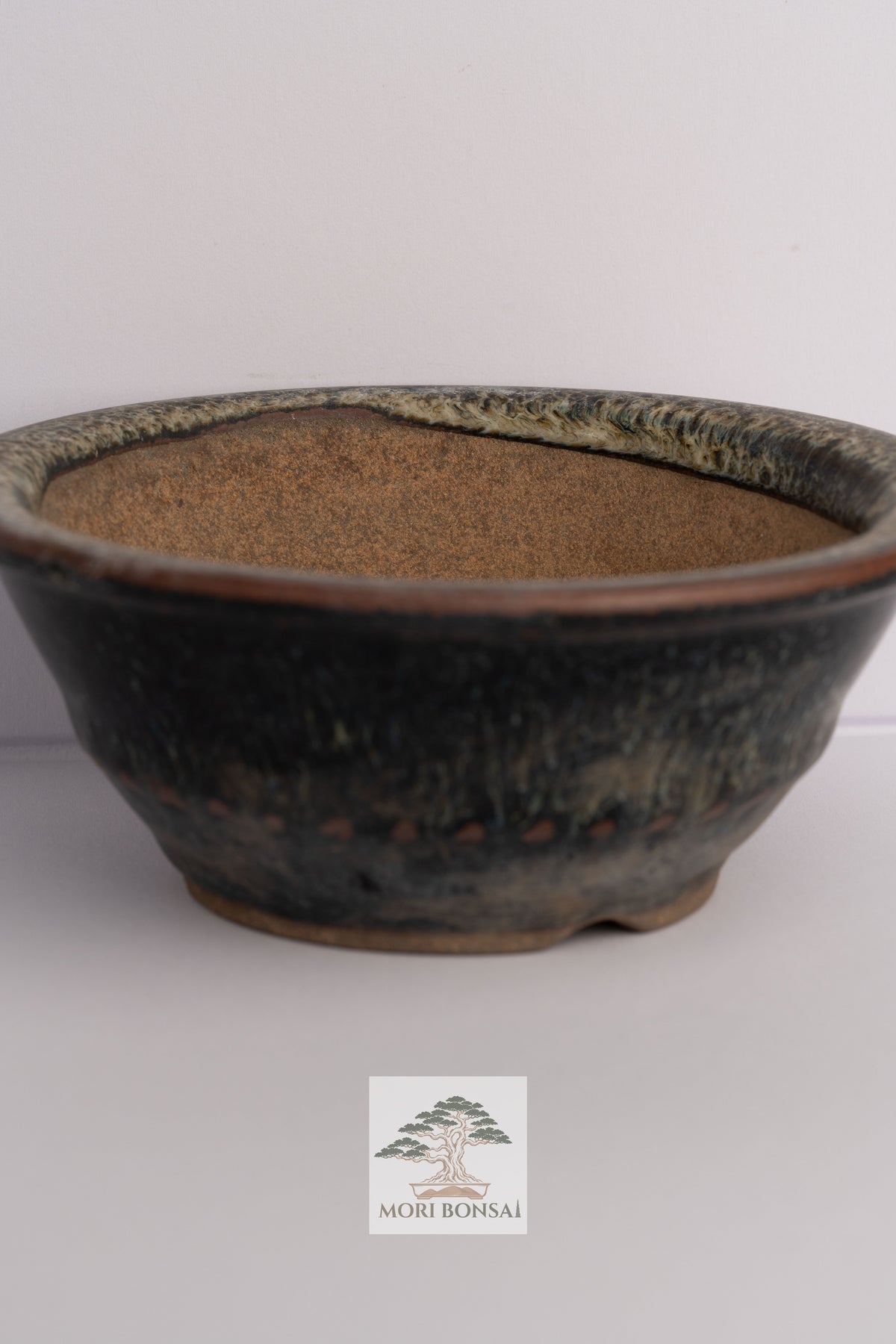 Aged Tokoname round bonsai pot POT-TOKO-001 underside and drainage detail