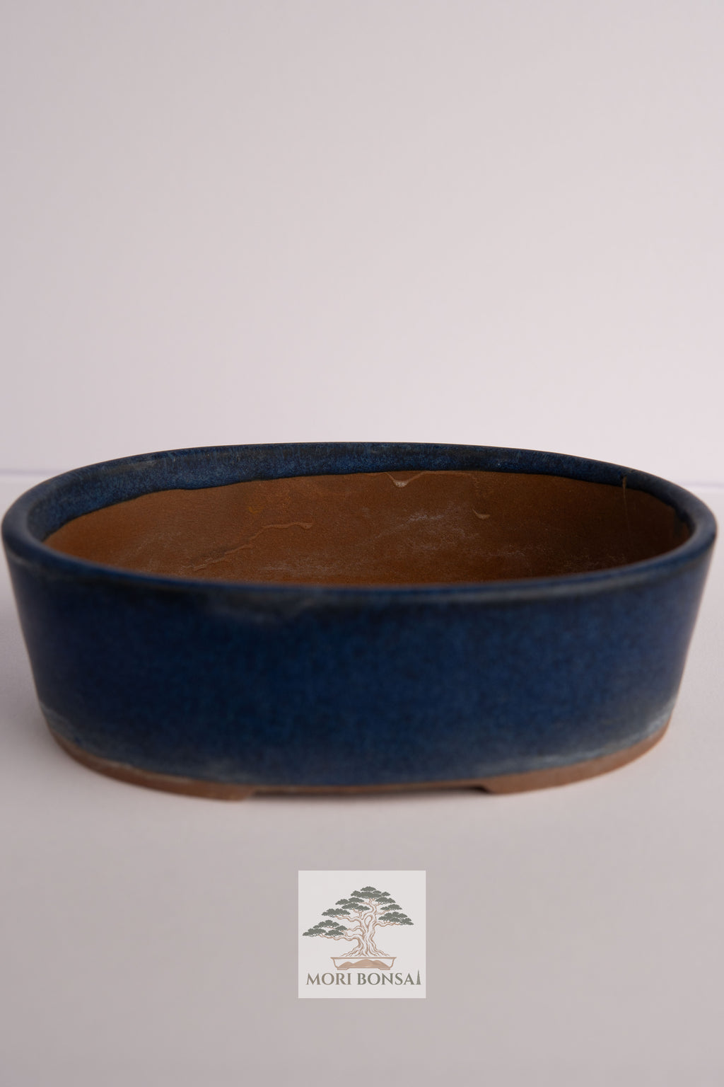 Aged Tokoname oval bonsai pot POT-TOKO-004 angled profile and glaze variation