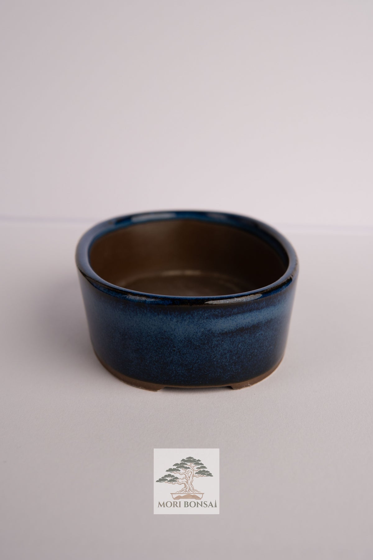 Aged Tokoname compact round bonsai pot POT-TOKO-005 angled profile and glaze detail
