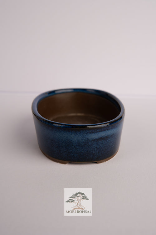 Aged Tokoname compact round bonsai pot POT-TOKO-005 angled profile and glaze detail