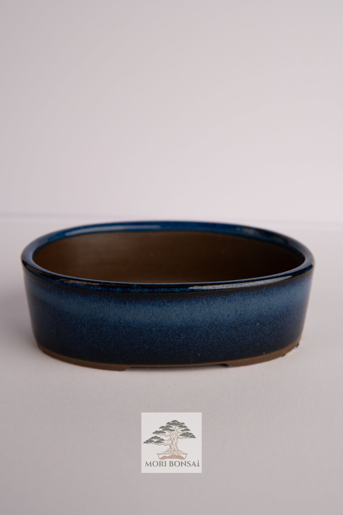 Aged Tokoname compact round bonsai pot POT-TOKO-005 front view with rich blue glaze